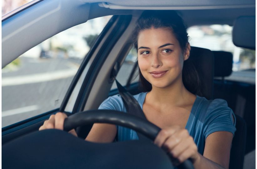 Woman driver thinking about getting a secured loan.